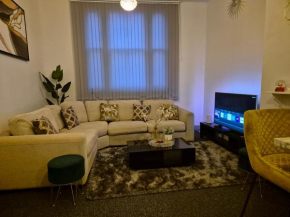 Flourish Apartment